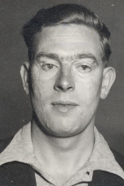 A black and white portrait of blind veteran James Padley