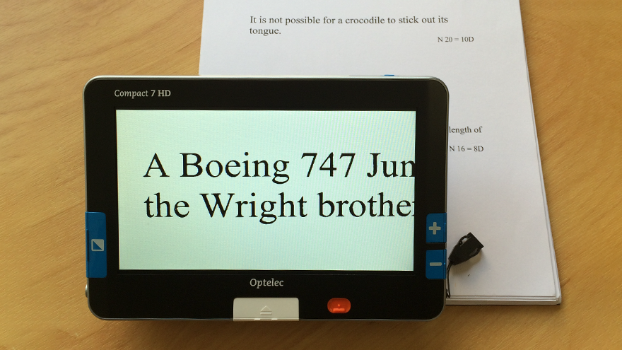 A photo of an electronic magnifier for reading