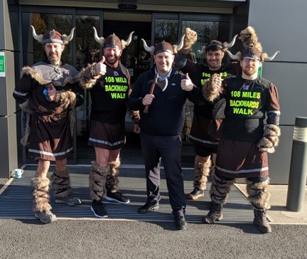 The group are ready for their challenge dressed in their viking outfits with their thumbs up
