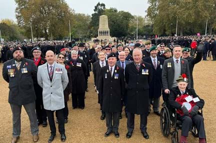 Blind veterans and their guides ready to march at the Cenotaph