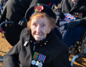 Photo of blind veteran Margaret at Remembrance ceremony