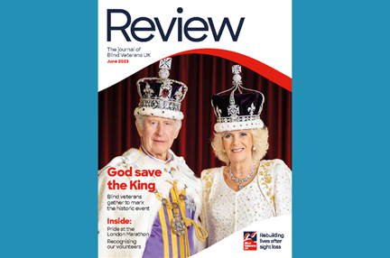 A magazine front cover with title "God save the king" and an image of King Charles and Camilla wearing crowns