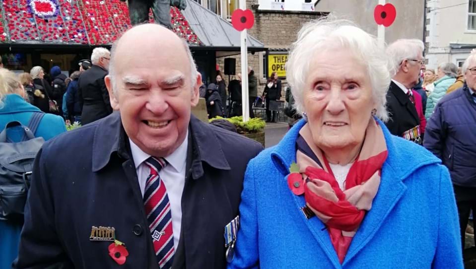 Rod And Pat smiling on Remembrance Sunday event outside