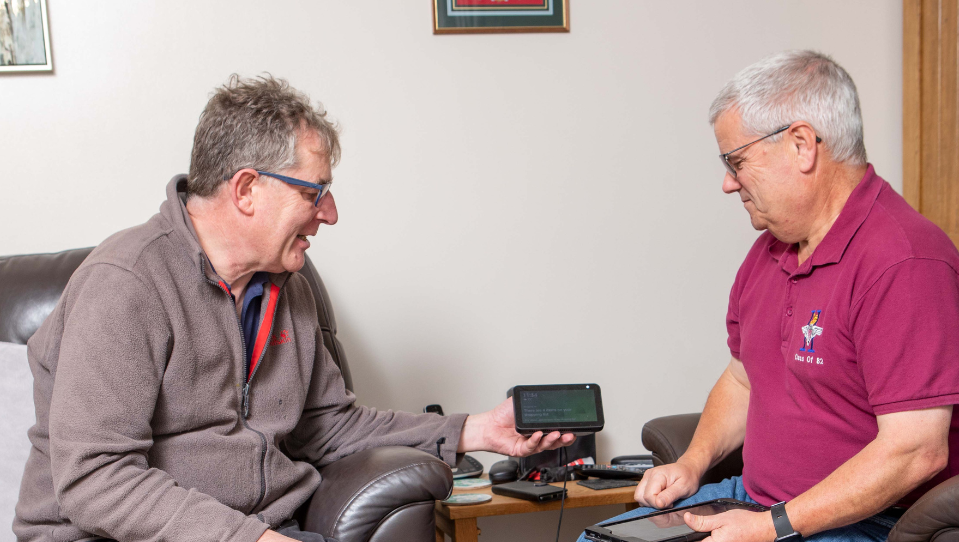 Blind veteran Steve with his Community Support Worker, Henry