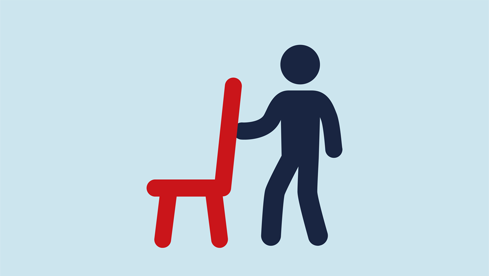 Icon of a person putting their hand on the back of a chair