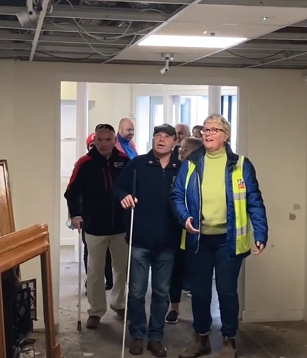 A photo of our beneficiaries visiting our new wellbeing centre in Rustington before the building is refurbished
