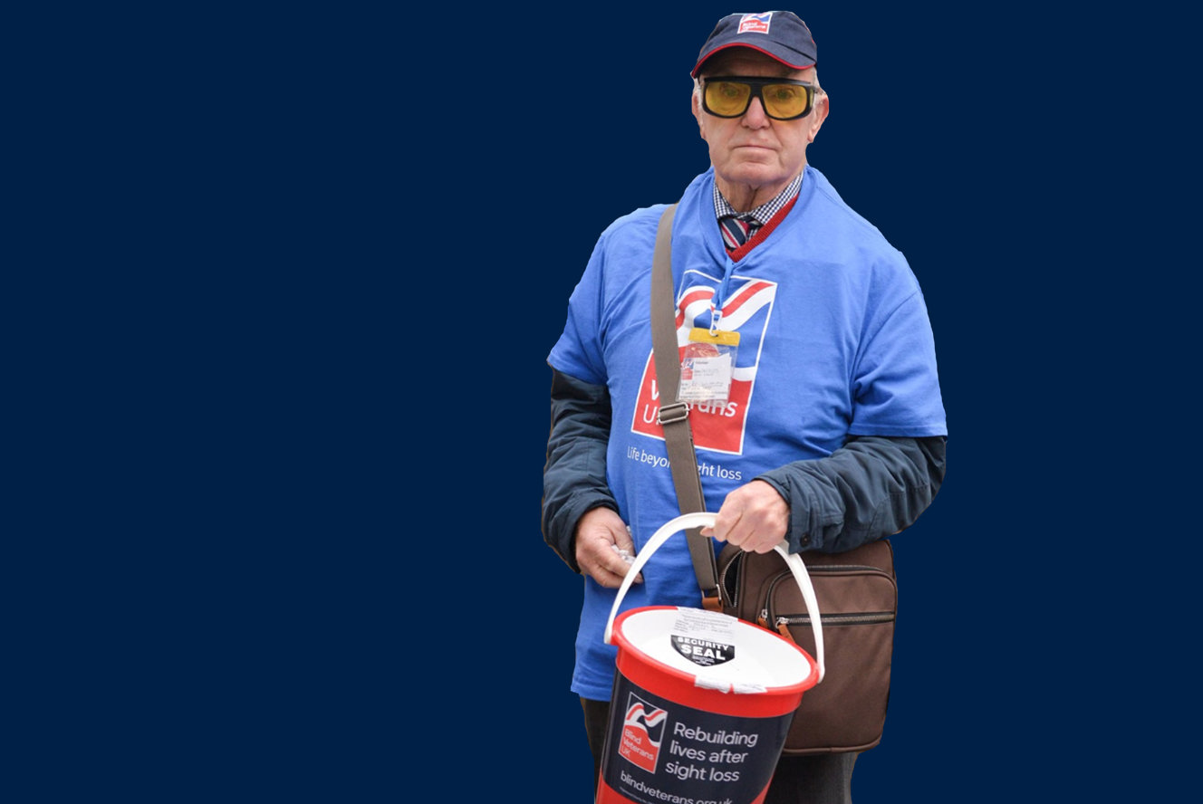 A photo showing blind veteran and volunteer Kenneth holding a collection bucket
