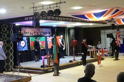 A stage with veterans wearing their medals during the event at St Oswald's last year