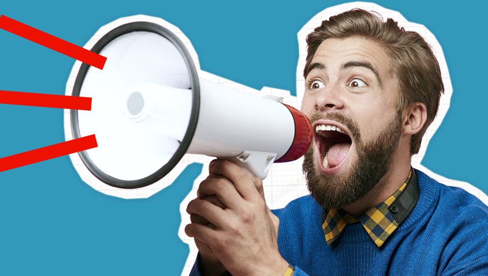 A man shouting into a megaphone