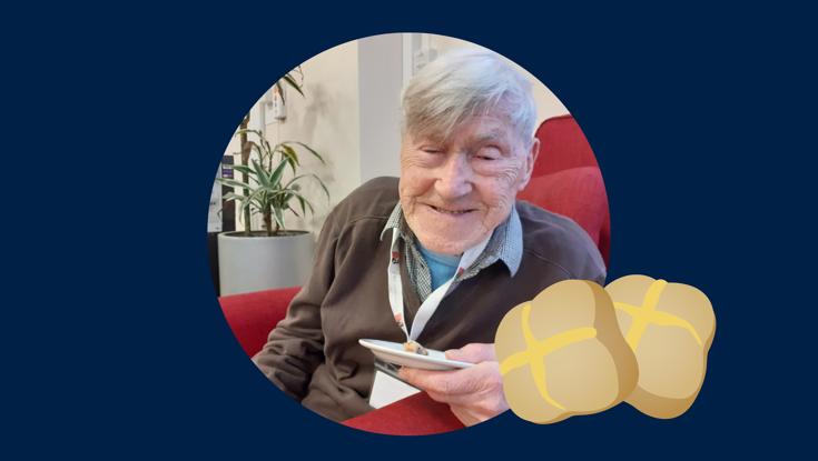 Blind veteran George smiling, with an added illustration of a hot cross bun 