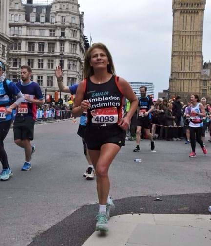 Emilia running passed Big Ben during a previous London Marathon