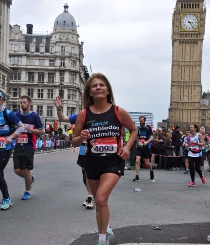 Emilia running passed Big Ben during a previous London Marathon