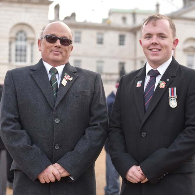 Blind veteran Mark and his son Ben on Horse Guards Parade in 2017
