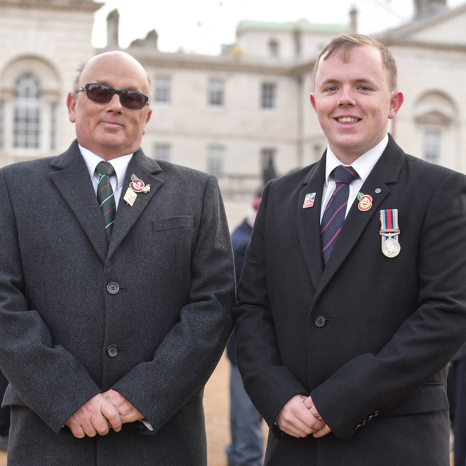 Blind veteran Mark and his son Ben on Horse Guards Parade in 2017