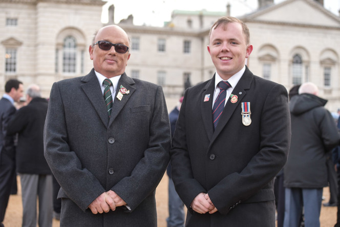 Blind veteran Mark and his son Ben on Horse Guards Parade in 2017