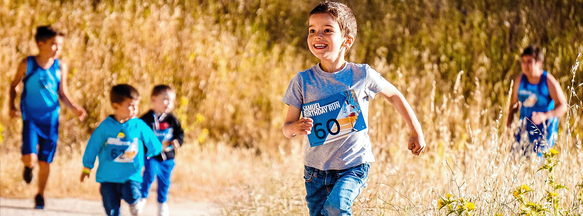 A group of children running for charity