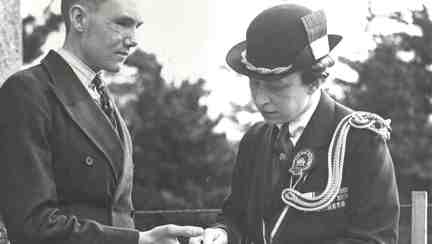 A photo of blind veteran Bill Cowing in 1941, talking to a visiting Princess Mary 