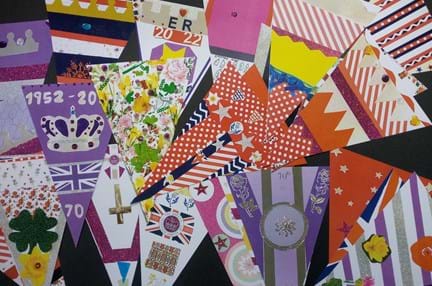 A photo of the several bunting designs made by our blind veterans