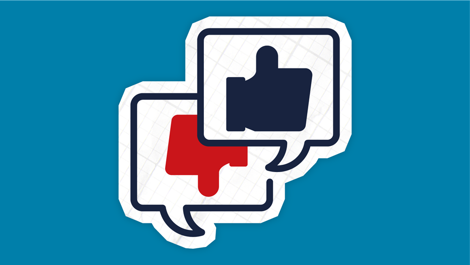 An icon of two speech bubbles with a thumbs up and a thumbs down