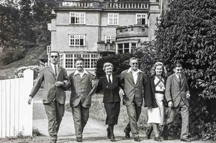 Four blind veterans accompanied by two nurses going for a walk at Church Stretton during World War II