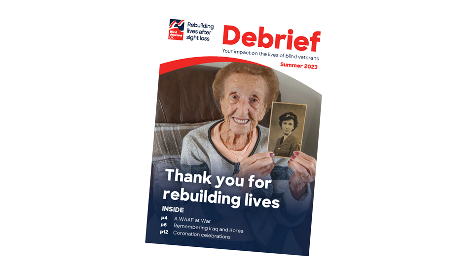 Supporter magazine front cover, with title "Thank you for rebuilding lives" and a photograph of a blind veteran holding up a photograph of her in the military