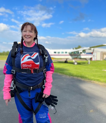 Claire just before her skydive, wearing her harness