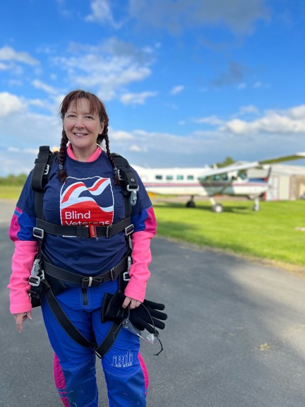 Claire just before her skydive, wearing her harness