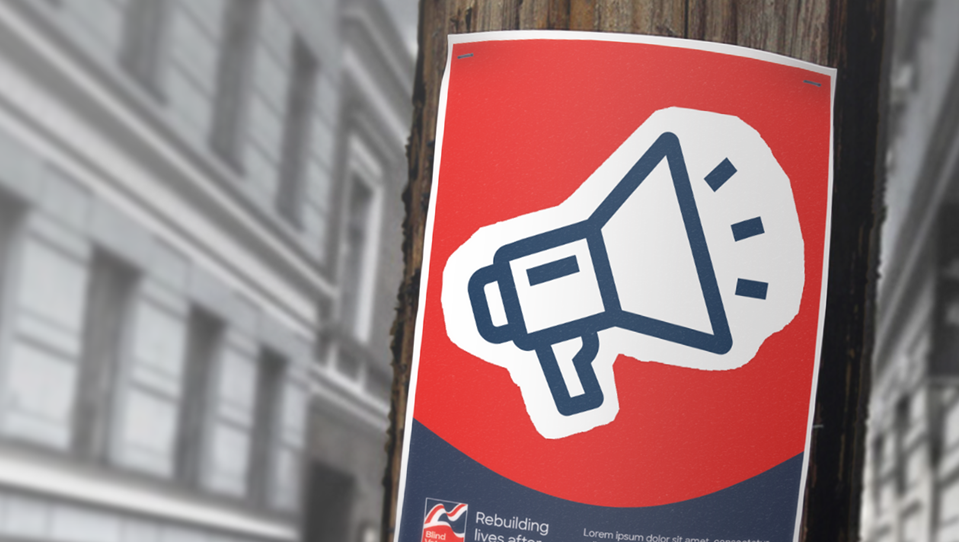 A Blind Veterans UK poster with a large megaphone icon
